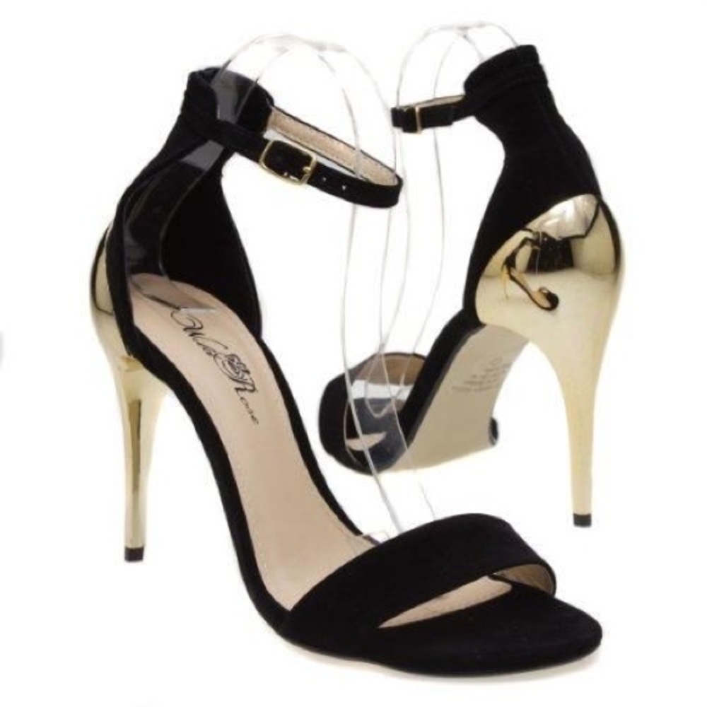 Black and gold heels